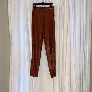 Fabletics Brown Faux Leather straight leg pants
Fit size 1-2 women